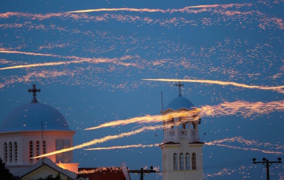 16 Amazing Photos From Annual Easter Rocket Wars in Chios