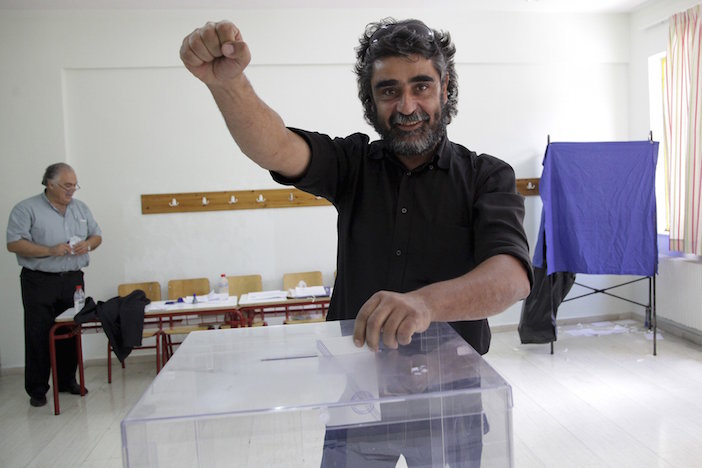 A defiant voter in the mountain village of Anogeia