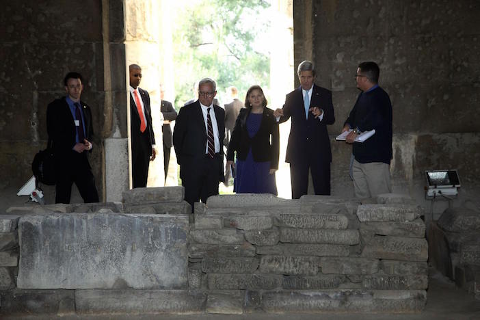 Secretary of State John Kerry hears about the origins of Athenian Democracy from Dr. Kevin Daly of the American School of Classical Studies at Athens at the Temple of Hephaestus
