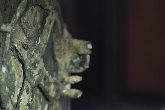 A Fragment of the 2,100-year-old Antikythera Mechanism, believed to be the earliest surviving mechanical computing device, is displayed at the National Archaeological Museum, in Athens
