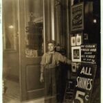 Young Greek bootblack at an Indianapolis shoe-shining parlor at 10 p.m. in 1908