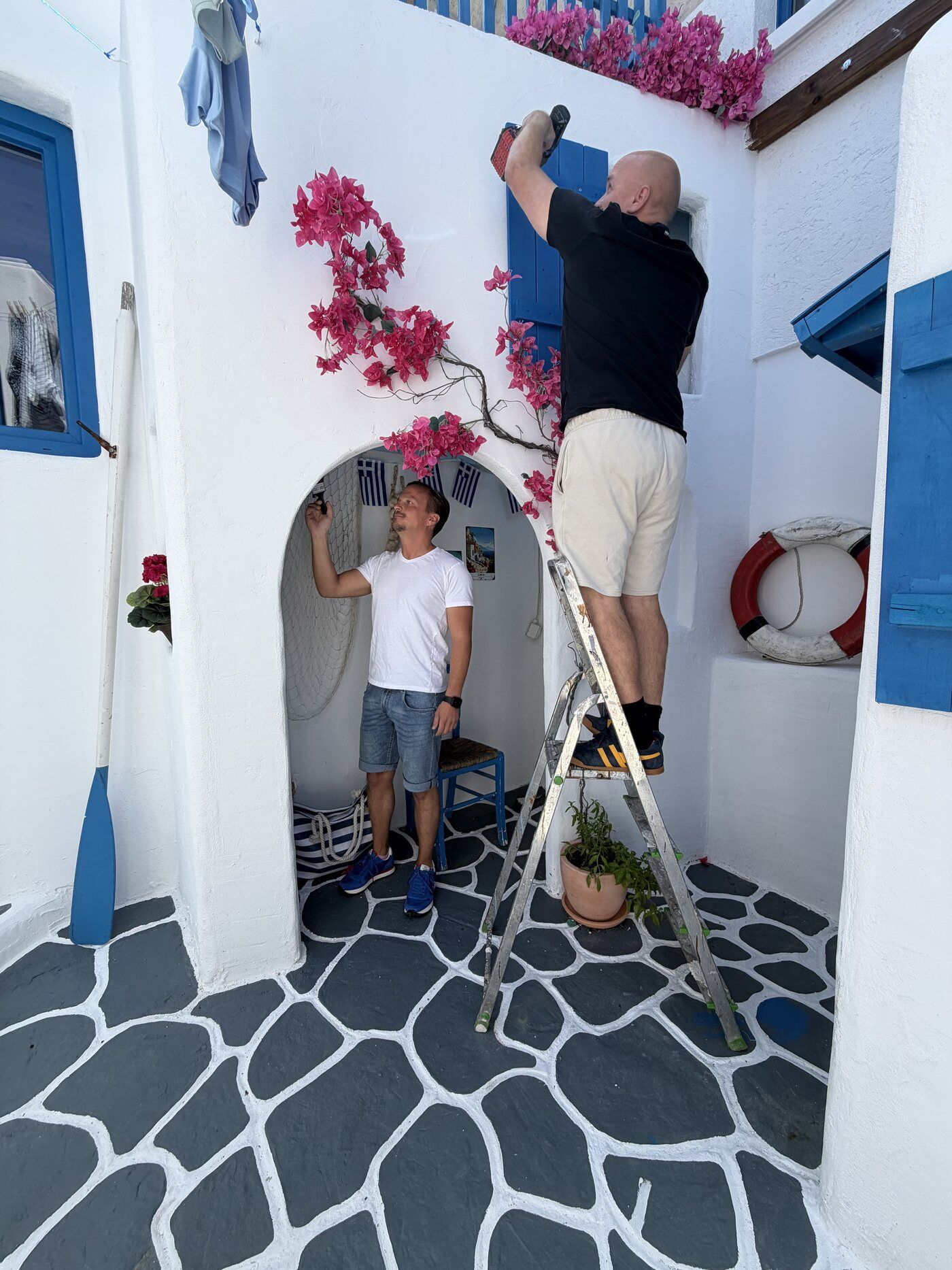 Michael and Samuel Scherrer working inside their Little Greece garden project