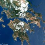 Satellite view of Meltemi winds creating streaks and vortices around the Cyclades in the Aegean Sea