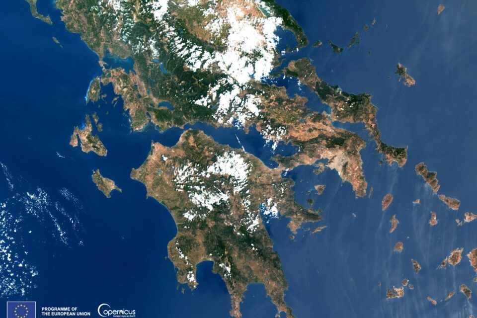 Satellite view of Meltemi winds creating streaks and vortices around the Cyclades in the Aegean Sea