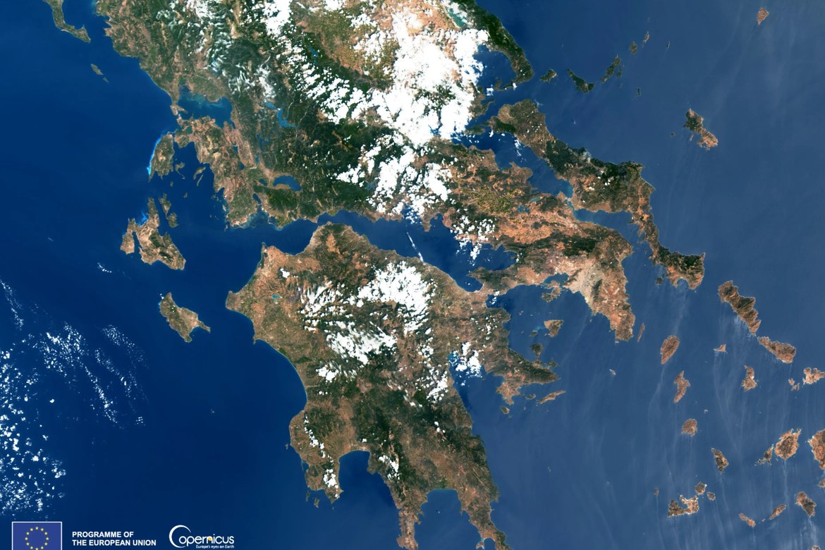 Satellite view of Meltemi winds creating streaks and vortices around the Cyclades in the Aegean Sea