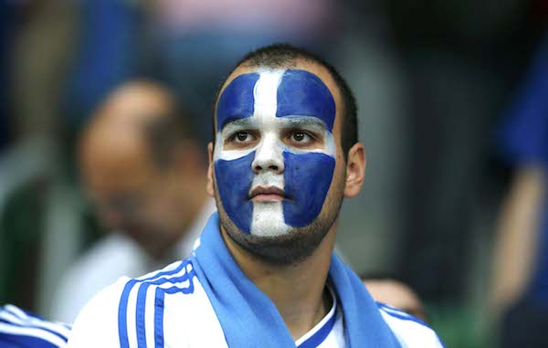 Greece's fan looks dejected after the Group A Euro 2012 soccer match against Czech Republic at city stadium in Wroclaw