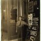 Young Greek bootblack at an Indianapolis shoe-shining parlor at 10 p.m. in 1908