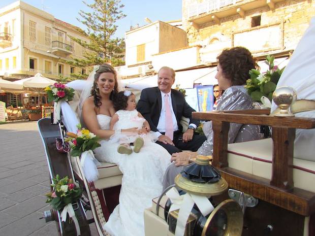 In traditional fashion, Stephanie, with her father and niece in hand, arrive at Trimartiri Catherdal